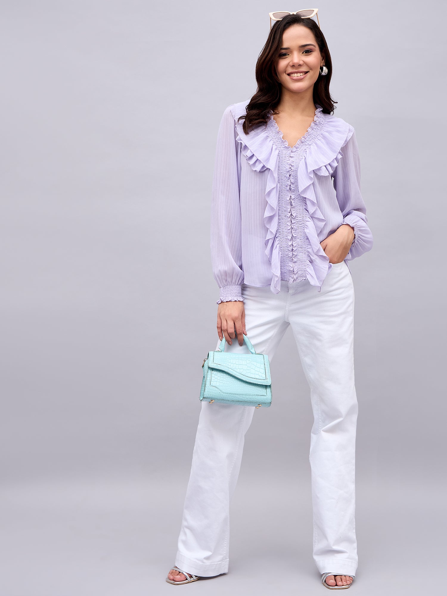 Lavender ruffle top styled with white trousers – NUWAH
